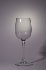 empty wine glass of water on black background