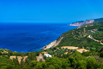 Naklejka na ściany i meble mediterranean shore with blue see and cloudless sky