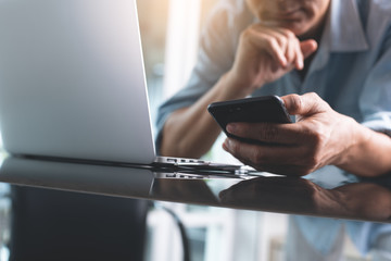 Business man using smartphone