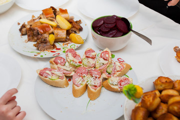 Delicious homemade appetizer serving on table at home