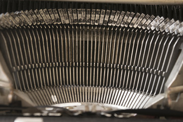 typebars of an old typewriter