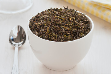 green tea leaves in a bowl