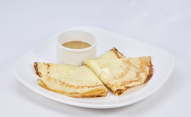 pancakes with honey and cup of tea