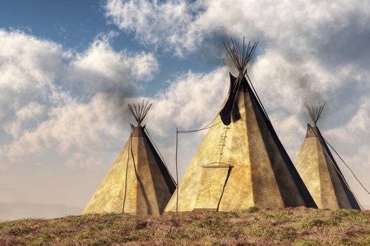 Three teepees (also called tipis or tepees) which are Native American tents, stand on a grassy hill in the plains of the American west. 3D Rendering  