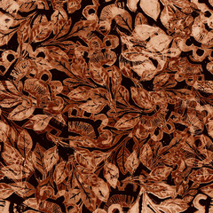 abstract floral ornament of dark brown and light brown drawn on a dark background