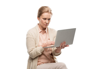 confused middle aged woman using laptop Isolated On White