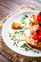 Breakfast - fried egg and sandwiches