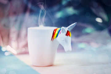 Unicorn shape mug with hot tea
