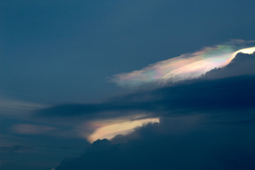 Fototapeta na wymiar rainbow cloud on the blue sky