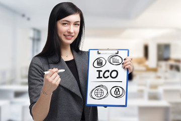 Business, technology, internet and networking concept. Young entrepreneur showing keyword: ICO