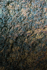 Stone surfaces with rust stains are very dense and coarse.