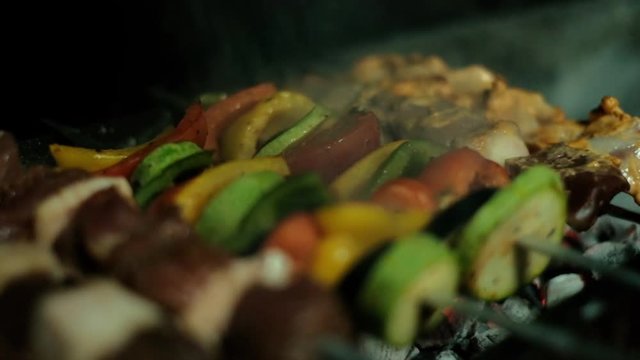 Smokin eastern roasted meat (shaslik) and vegetables on the grill