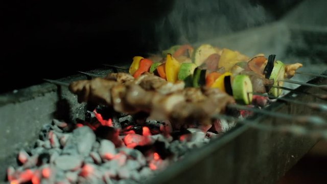 Smokin eastern roasted meat (shaslik) and vegetables on the grill