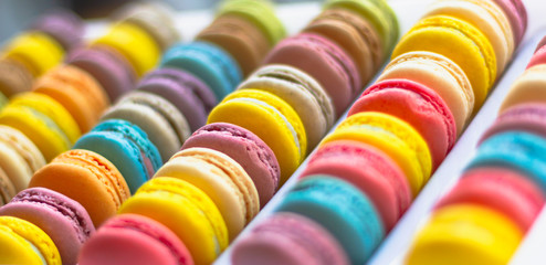 Colorful and delicious macaroons lined up side by side