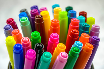 Close-up of lots of Assorted Colors Marker Pens. selective focus. 