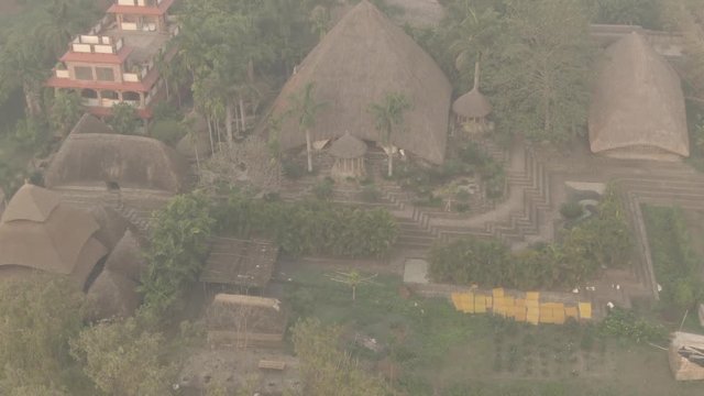 Traditional India eco-building school. Mayapur, India. 4k aerial ungraded