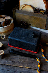 Christmas or New Year homemade, alternative toys and twigs of pine on a wooden background close-up