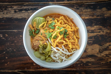Curry noodle soup, Khao Soy, a traditional dish in Chiang Mai, Northern Thailand.