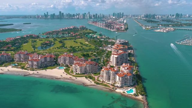 MIAMI, FLORIDA, USA - MAY 2019: Aerial drone view flight over Miami beach. South Beach and Fisher island from above.