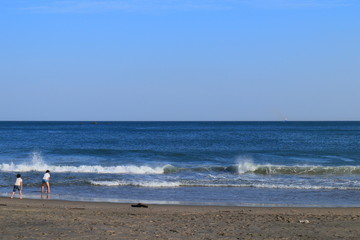 Little brothers on the beach