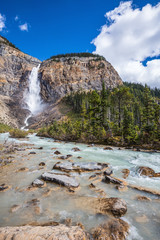 The waterfall forms water flow of pearl color