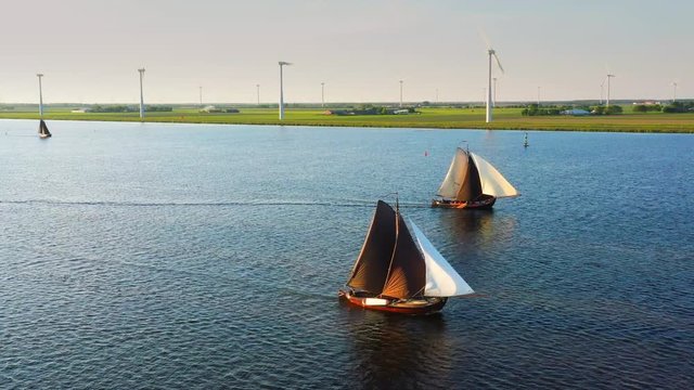 Aerial of typical Dutch blunter ships in a contest nearby village Spakenburg, The Netherlands
