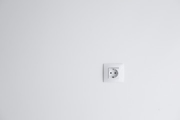 socket on the white wall, good for advertising