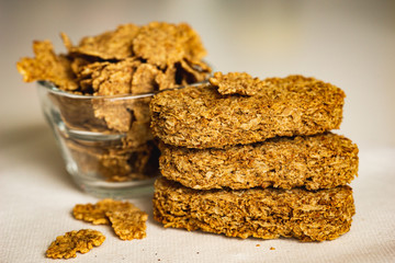 The concept of health, diet, proper nutrition. Healthy wheat crackers, crispbreads, grain crackers.