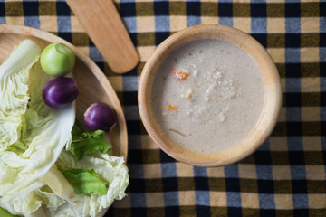 Pickled fish with minced pork in coconut milk