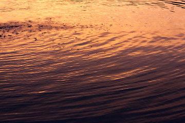 beautiful sunset reflected in the water of the lake