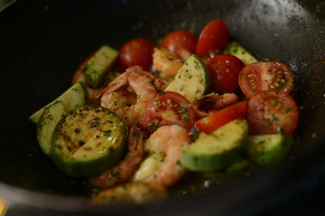 Making dinner at restaurant. Proffesional cooker