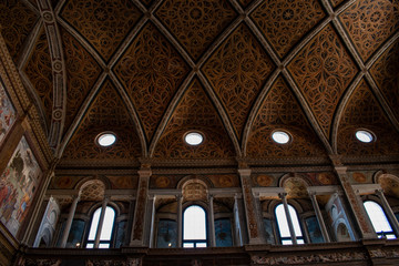 Fototapeta premium Italy, 03/28/2019: the interior of San Maurizio al Monastero Maggiore, 1518 church known as the Sistine Chapel of Milan, details of the chapels in the faithful's area with frescoes by Aurelio Luini