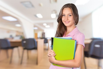 Young Female College Student  on background