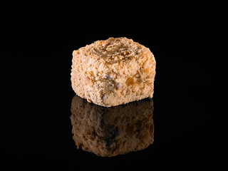 piece of cake on black background