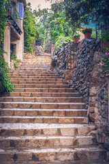 Stone stairs in town Deia, Mallorca, Spain.