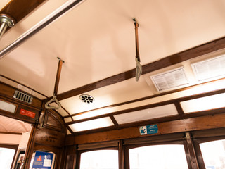inside view of the famous empty tram 28, roof detail, tourist destination par excellence in Lisbon