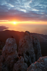 Beautiful sunrise in the mountains. Top of Ai Petri mountain sunset view. Crimea, Russia. vertical
