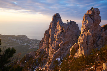 Obraz premium Beautiful sunrise in the mountains. Top of Ai Petri mountain sunset view. Crimea, Russia