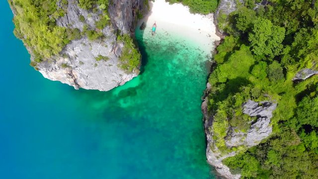 4k aerial view over hidden beach on remote island in Thailand