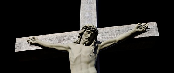Narrow horizonal top half of crucifix isolated on black