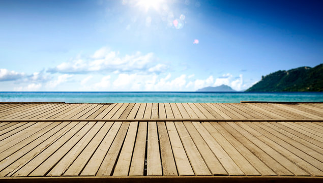Wooden pier of  free space for your decoration and summer sunny day. Free space for your decoration. 