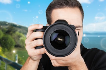 Male Photographer with Camera on  background