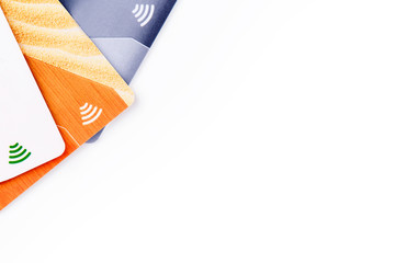 Credit cards with contactless payment. Pile of credit cards on white isolated background