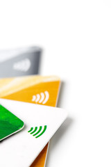 Credit cards with contactless payment. Pile of credit cards on white isolated background