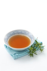 Field eryngo infusion in bowl (Eryngium campestre)