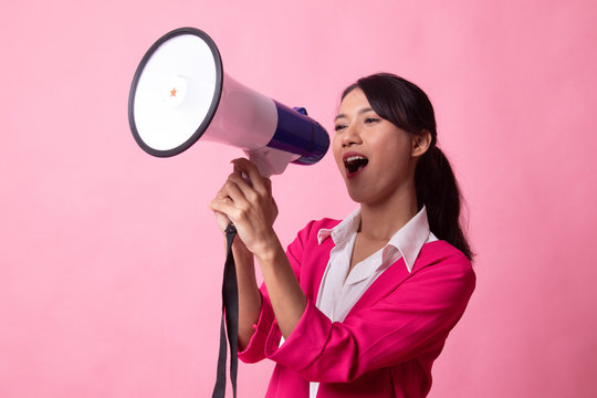Beautiful young Asian woman announce with megaphone.