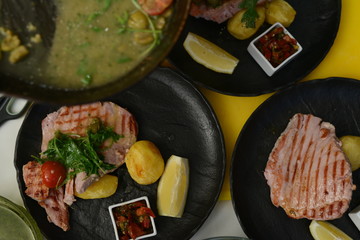 Making dinner at restaurant. Proffesional cooker