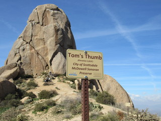View of Tom's Thumb with an information sign in the Sonoran McDowell Mountain range 
