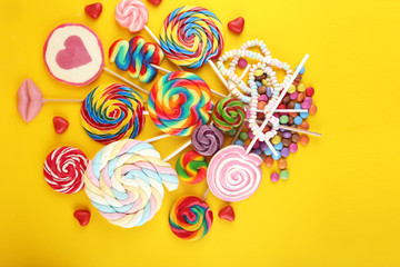 lolly candies with sugar. colorful array of childs lollipops sweets and treats with candy