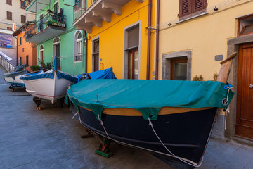Fototapeta na wymiar Cinqueterre, Italy . 04-19-2019. Little fishing boat at manarola villageone of five villages of Cinqueterre. Liguria. Italy.